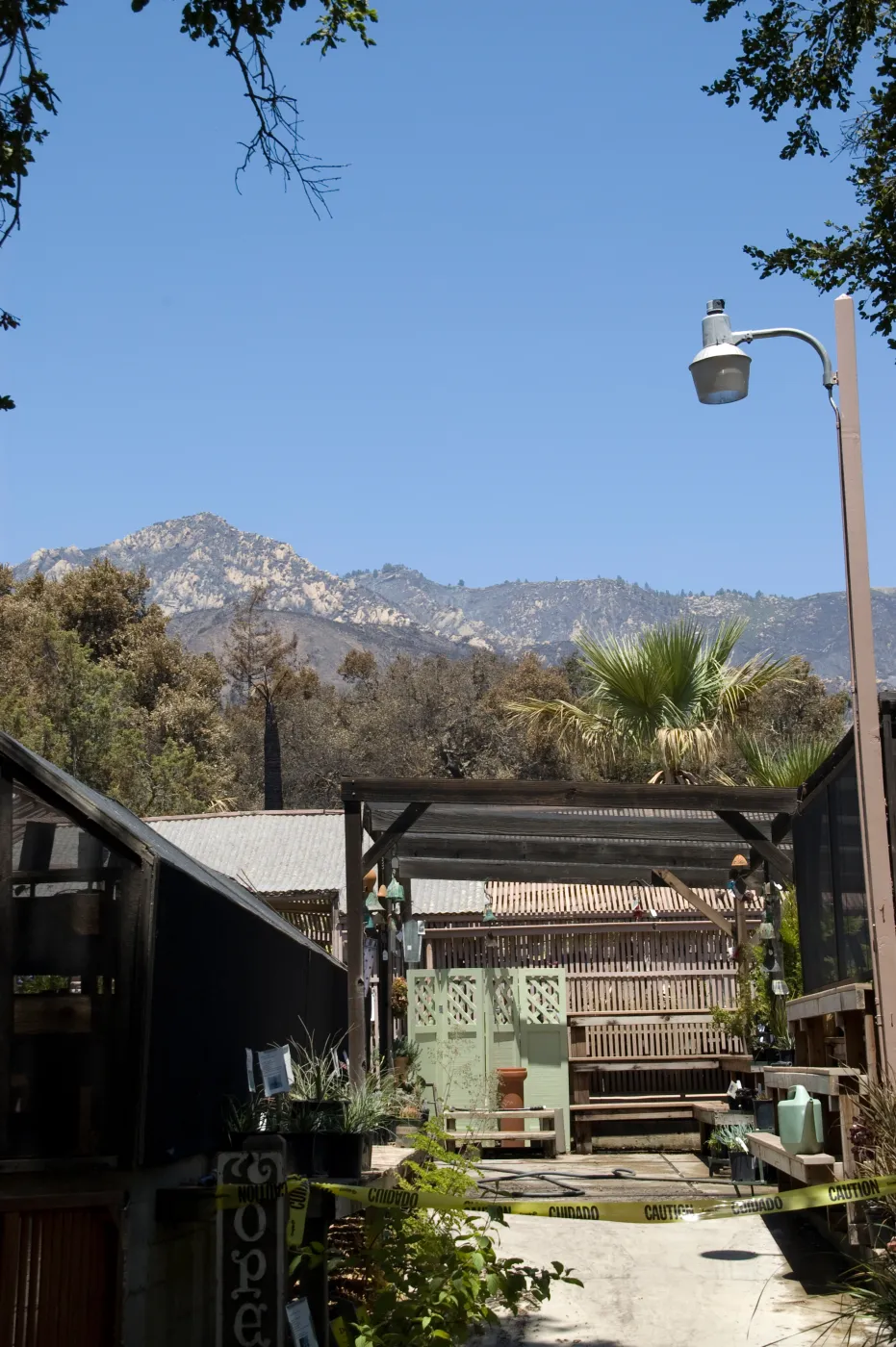 Garden Growers Nursery, with burned area behind, after the Jesusita Fire