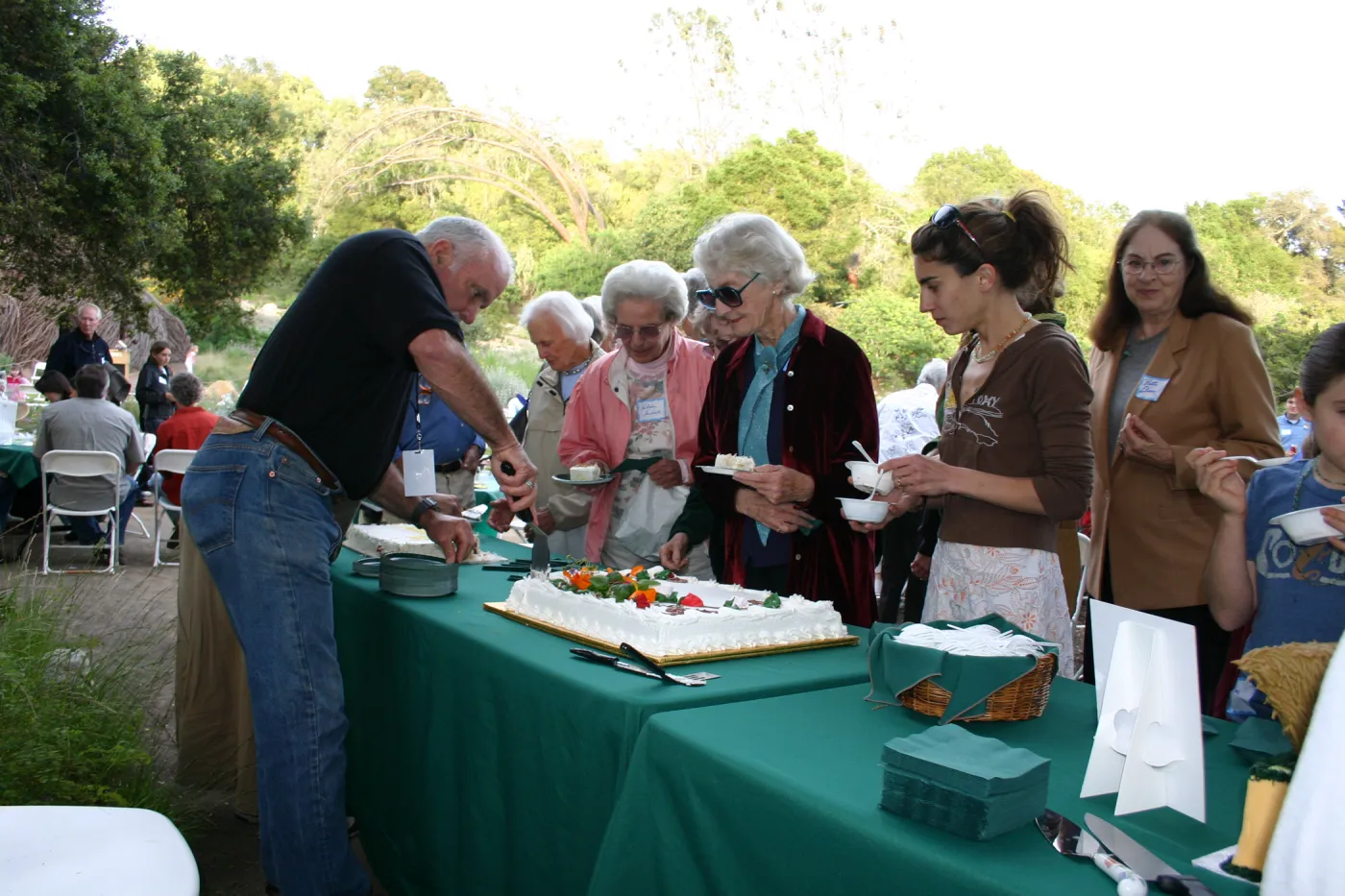 SBBG 80th Birthday Celebration, serving cake