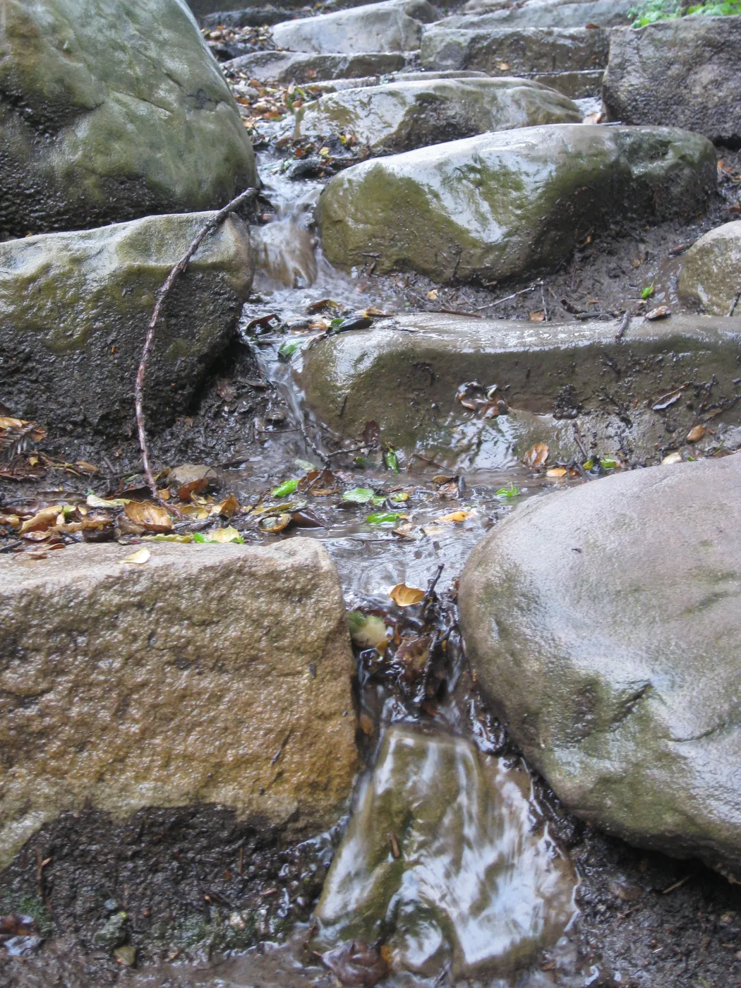 Water running off Indian steps during a hard rain
