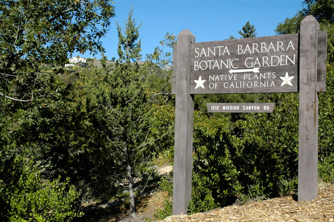 Santa Barbara Botanic Garden sign at Mission Canyon Road entrance to parking lot