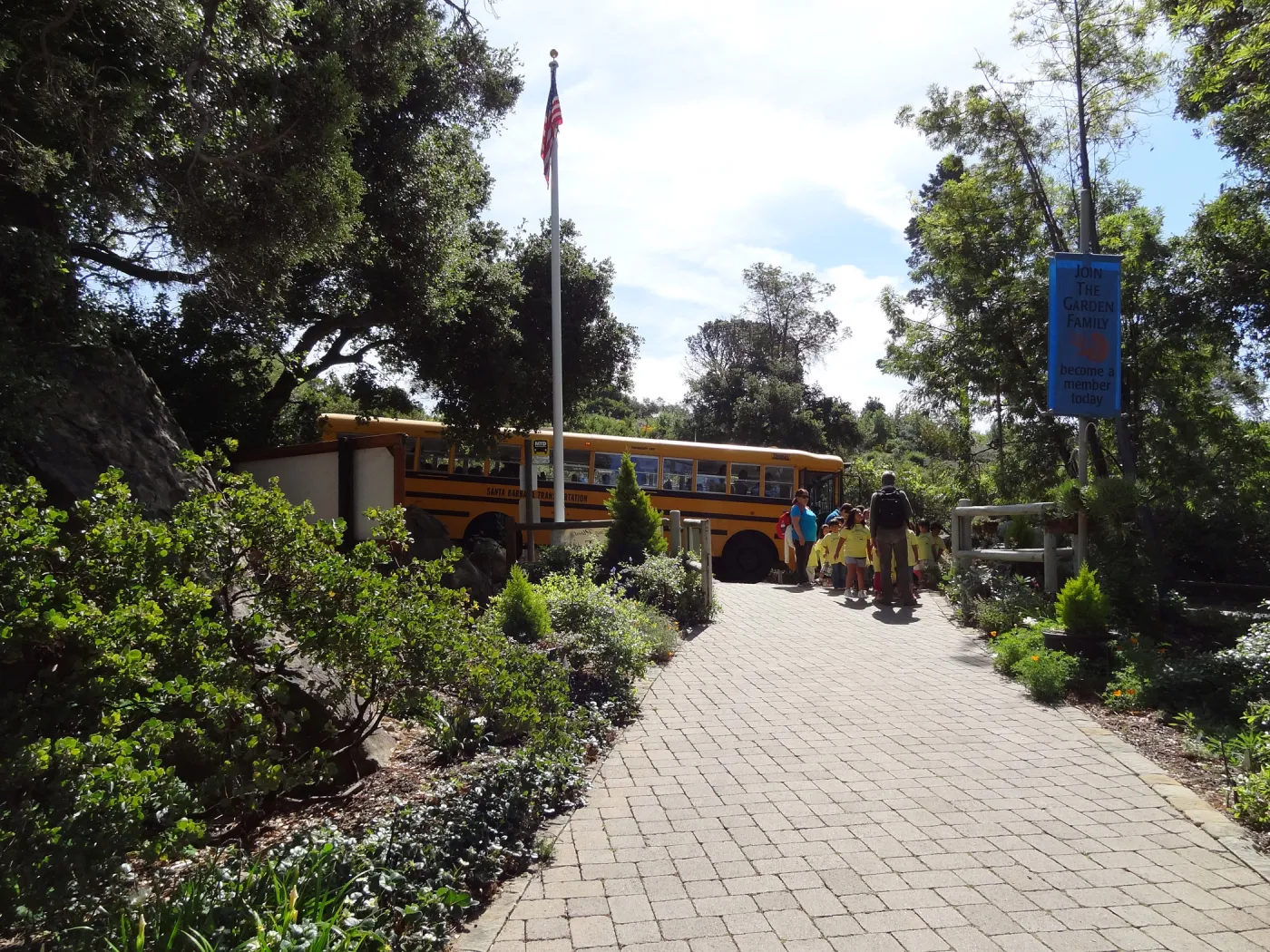 school bus arriving at Garden Entrance