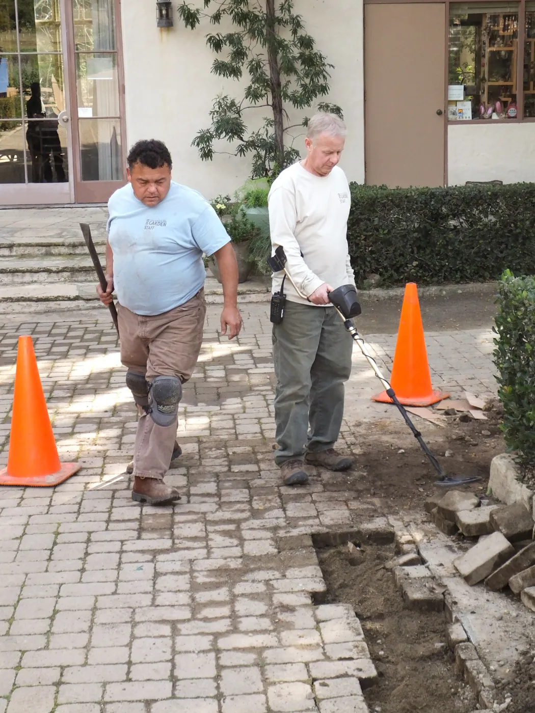 Working to repair broken water pipe in Courtyard
