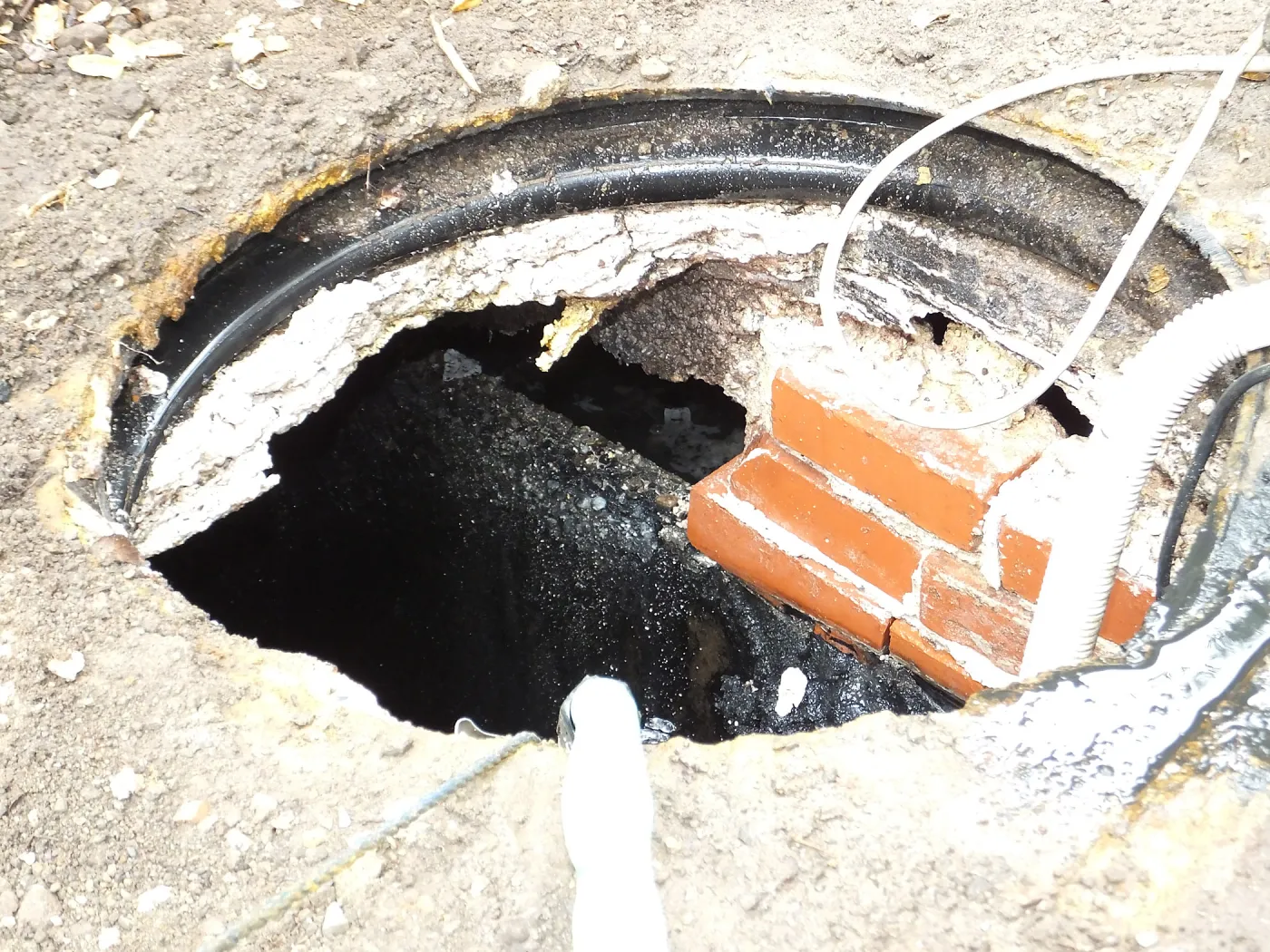Arroyo Sewer Line Construction-septic tank below herbarium to be abandoned