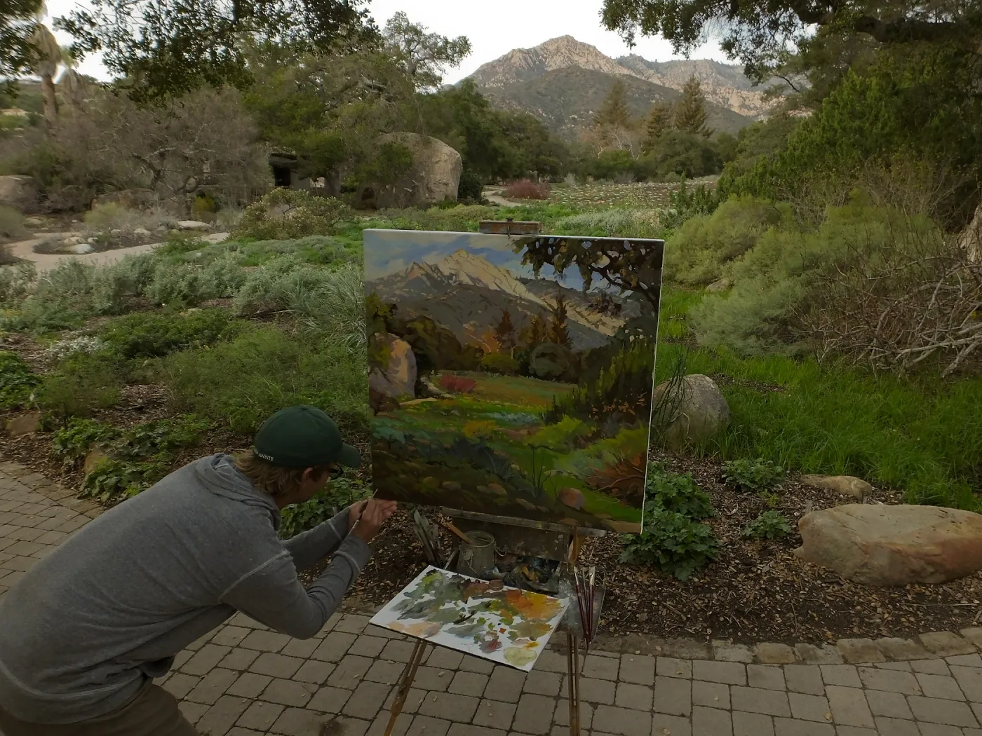 Plein Air artist Chris Potter signs painting of Meadow