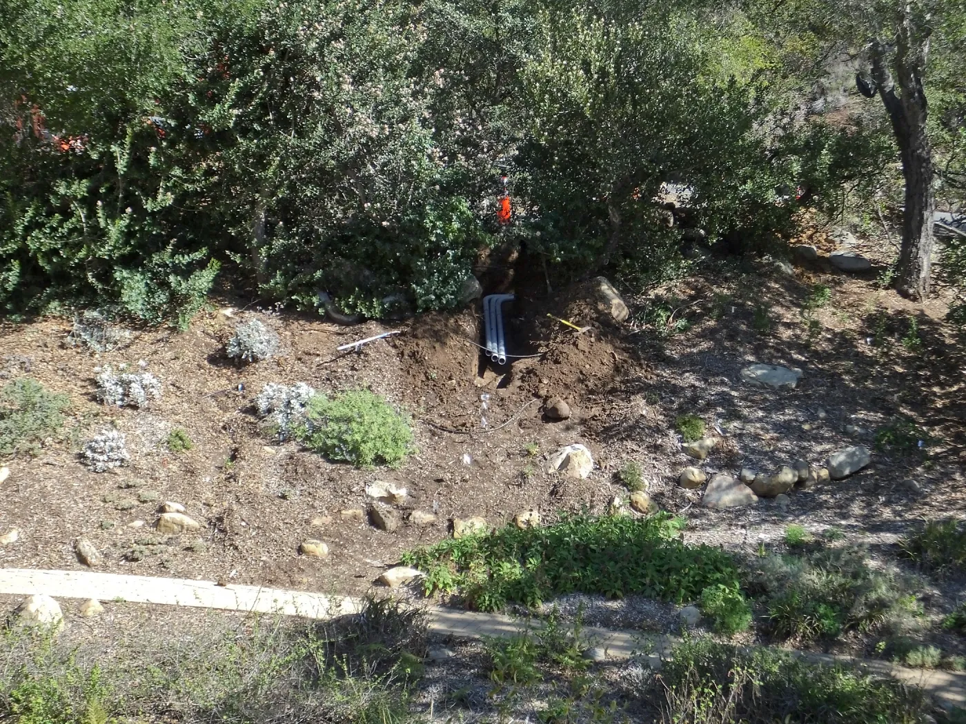 Power and data conduit being installed in the Arroyo Section