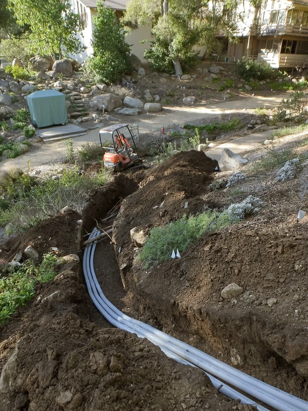 Power and data conduit being installed in the Arroyo Section