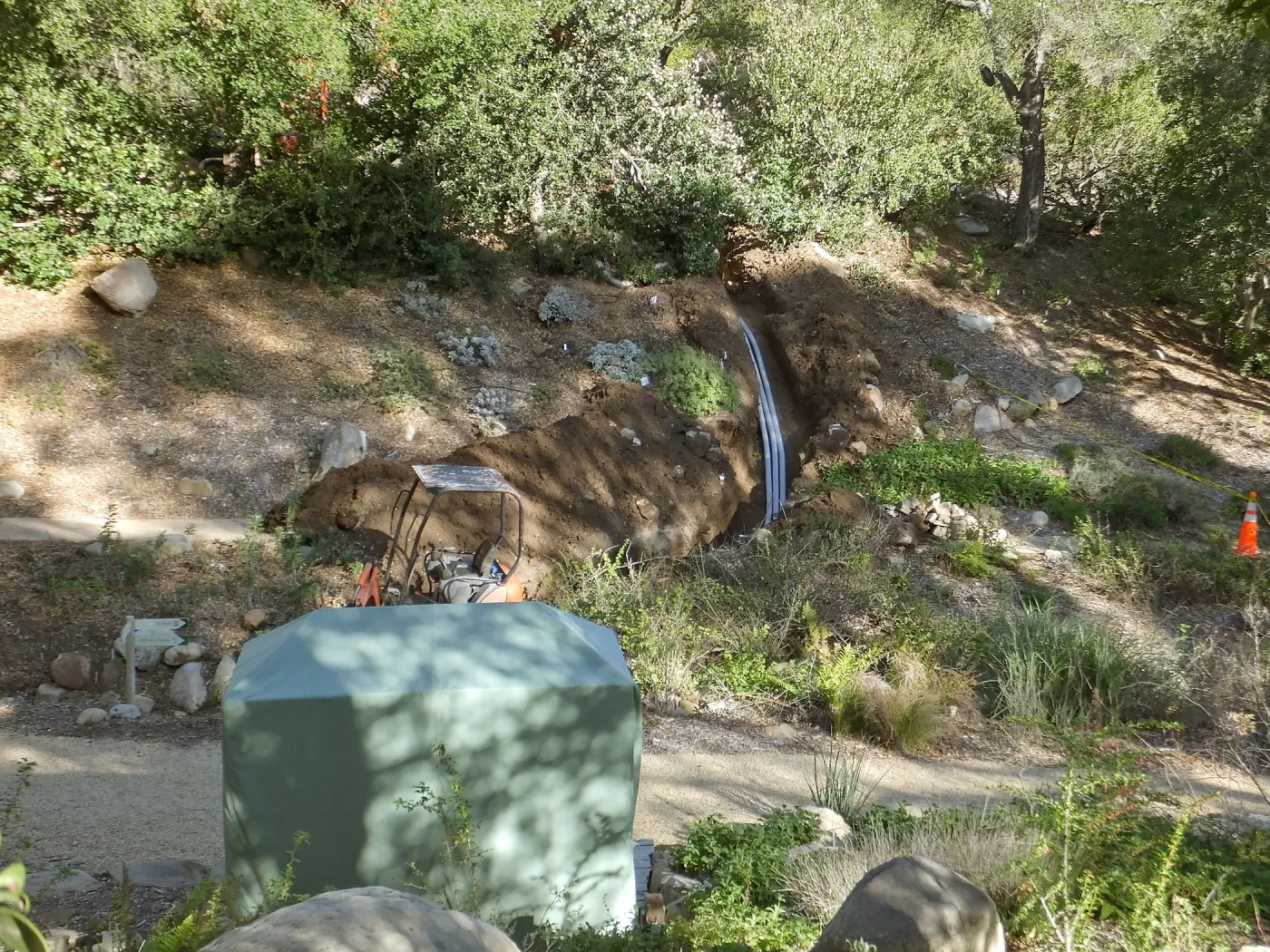 Power and data conduit being installed in the Arroyo Section