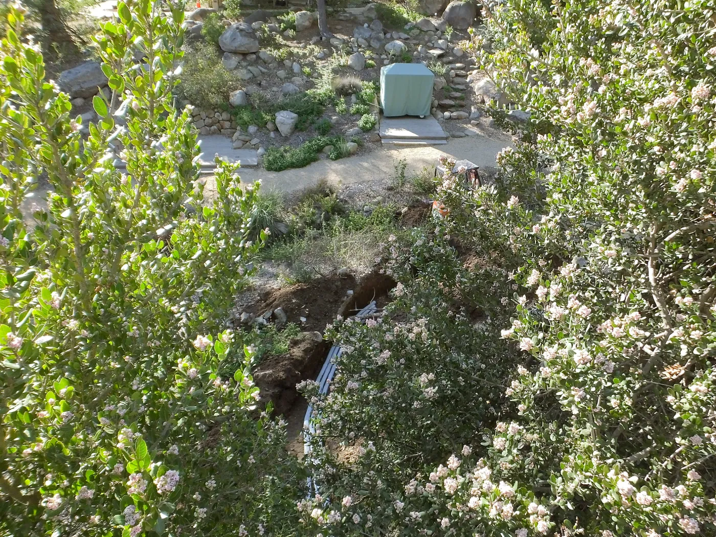 Power and data conduit being installed in the Arroyo Section