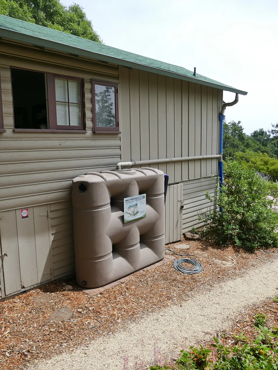 Home Demonstration Garden Renovation, rainwater collection system on west side of Cottage