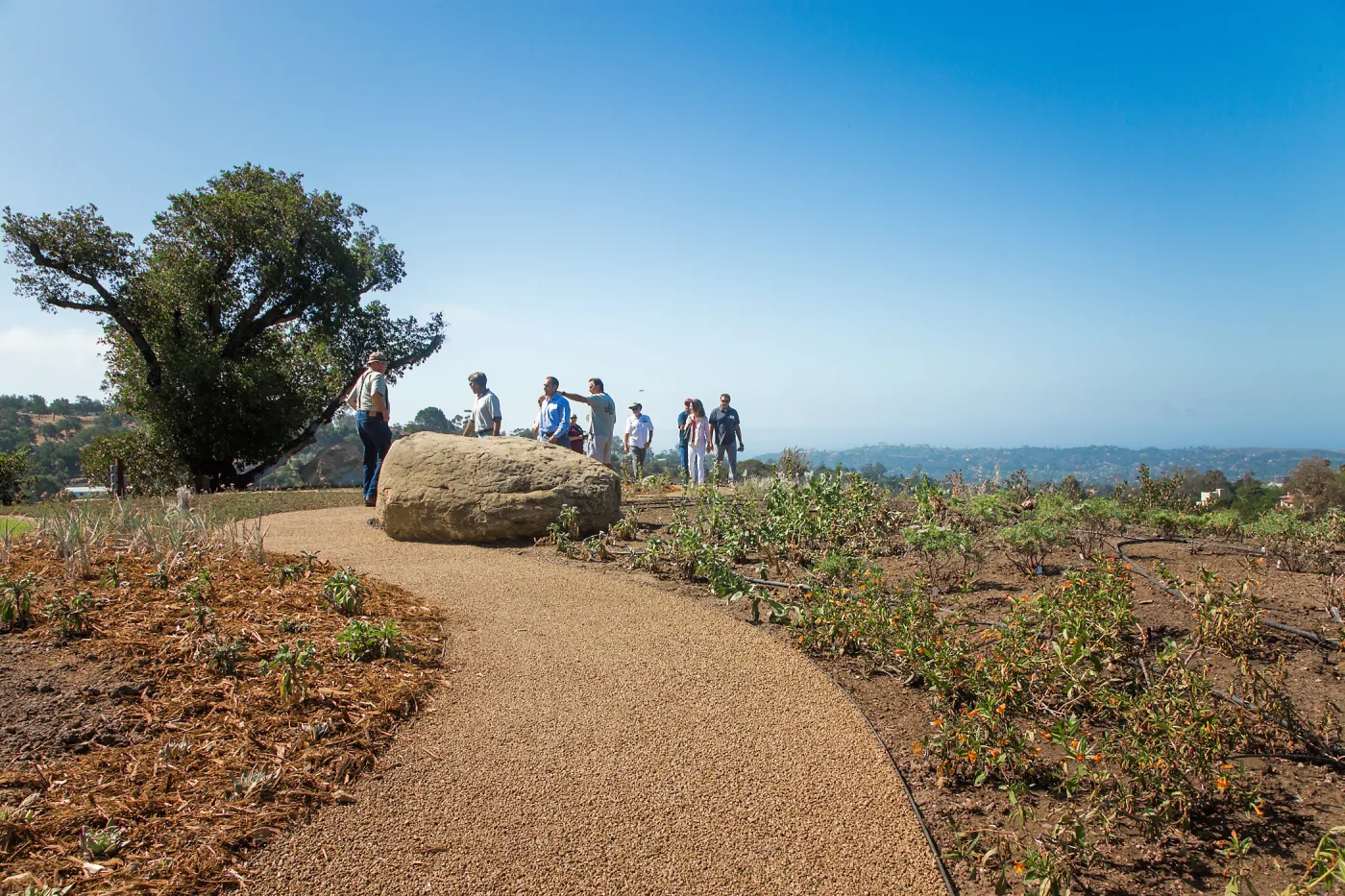 Pritzlaff Conservation Center Ribbon Cutting Celebration, guests exploring the newly planted Island View Garden