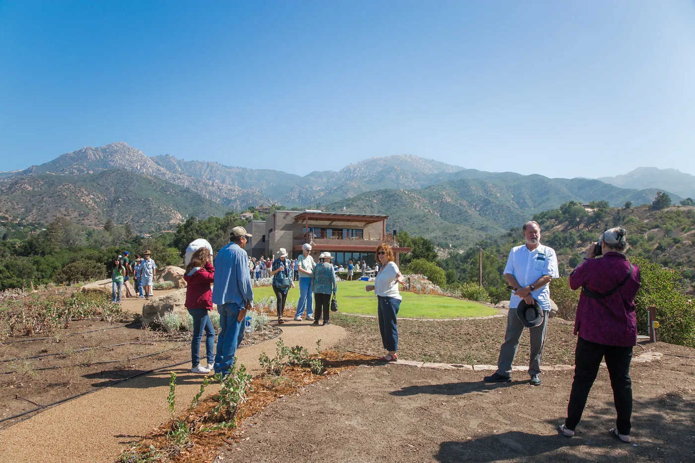 Pritzlaff Conservation Center Ribbon Cutting Celebration, guests exploring the newly planted Island View Garden