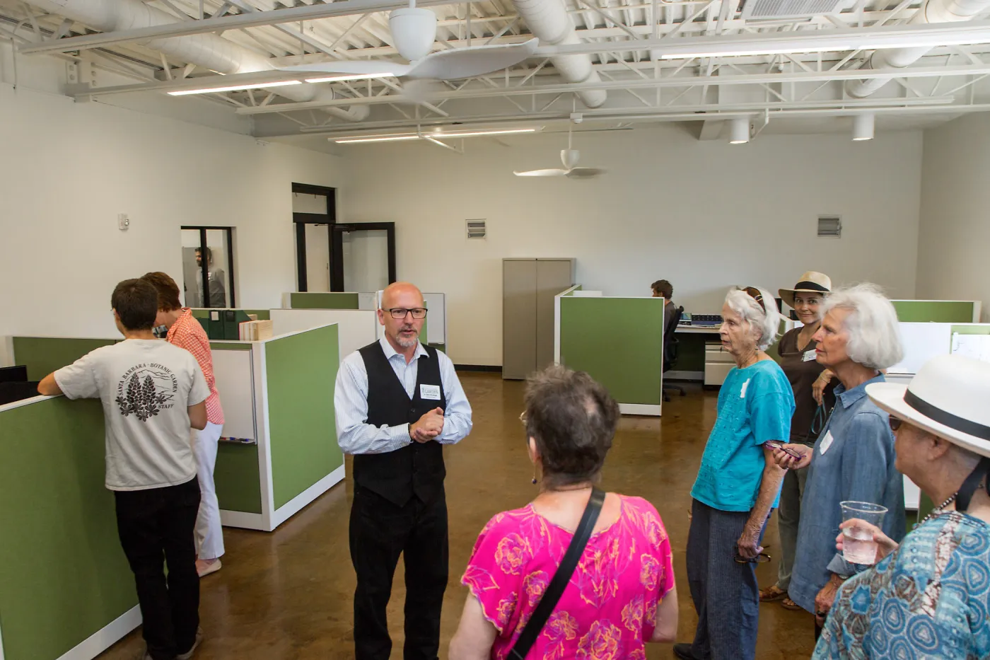 Pritzlaff Conservation Center Ribbon Cutting Celebration, Steve Windhyager leading tour in research workstation area