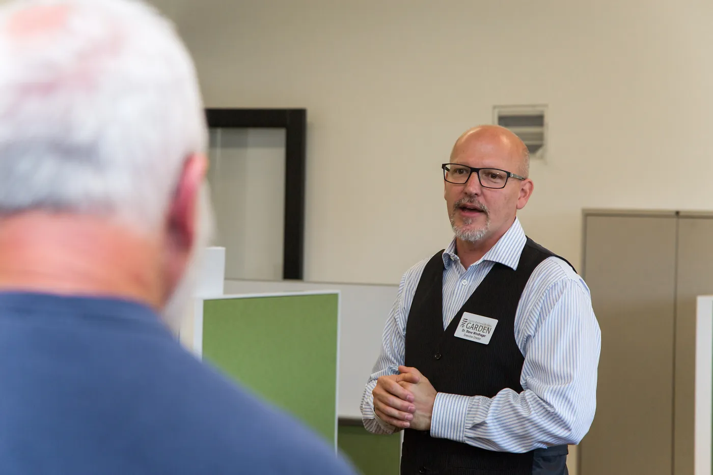 Pritzlaff Conservation Center Ribbon Cutting Celebration, Steve Windhyager leading tour in research workstation area