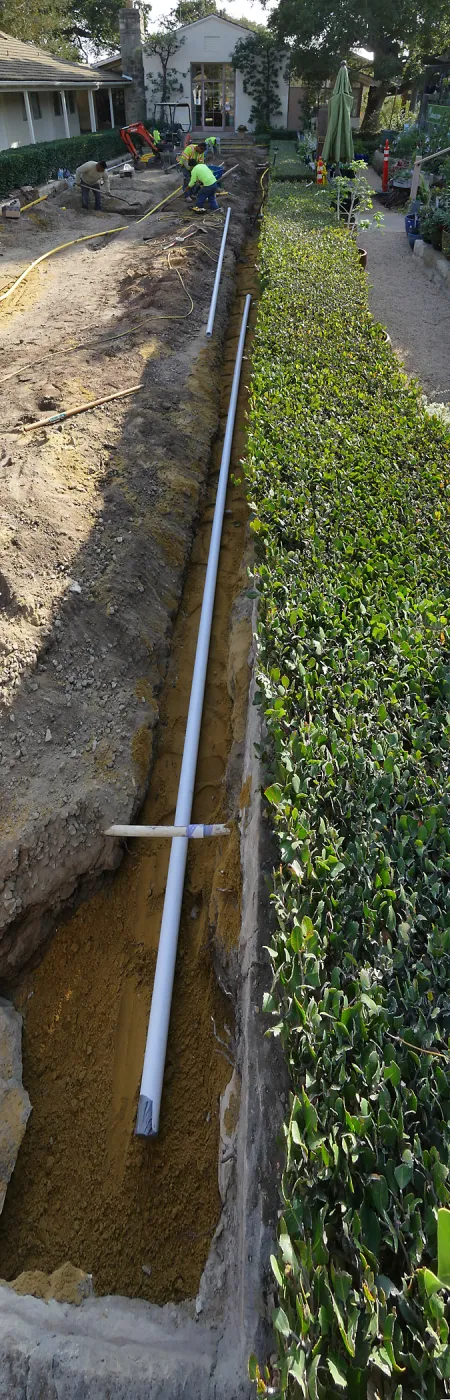 Courtyard renovation, rerouting piping, west edge looking south