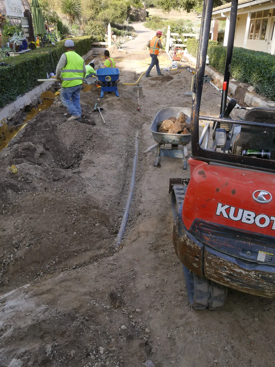 Courtyard renovation, rerouting piping, looking north