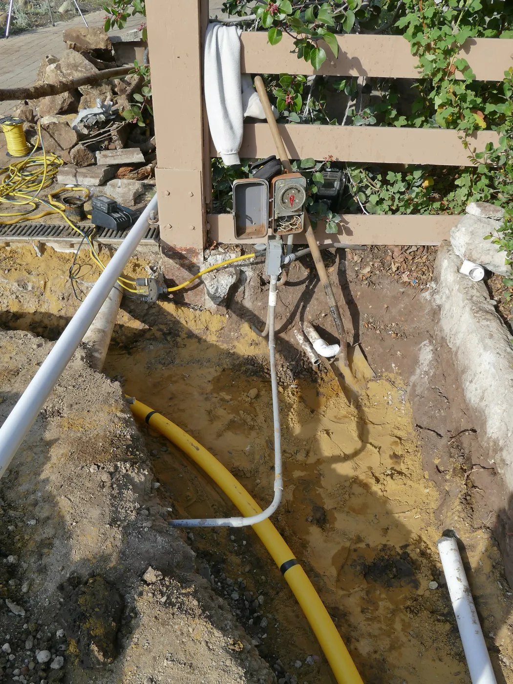 Courtyard renovation, rerouting piping, northest corner