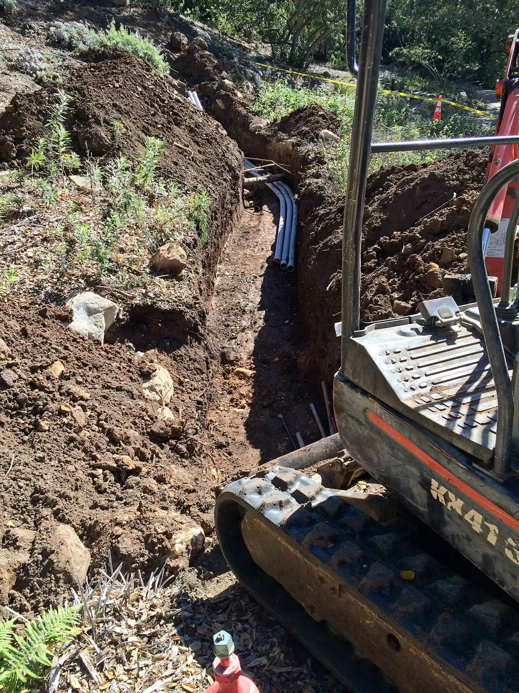 Power and data conduit being installed in the Arroyo Section