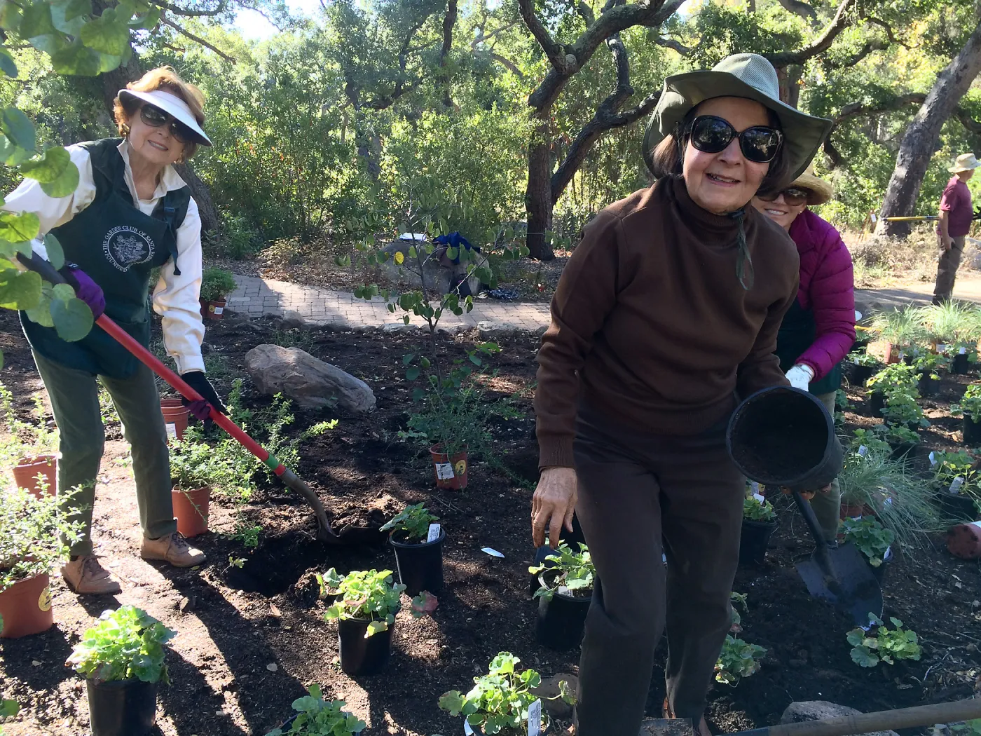 Volunteers helping with installation of the Wooded Dell