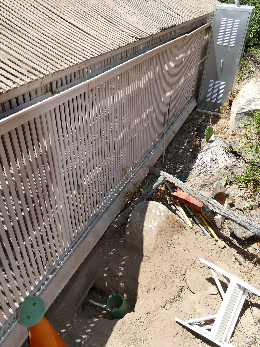 Garden Growers Lath House before start of repairs, water supply line and shutoff valve