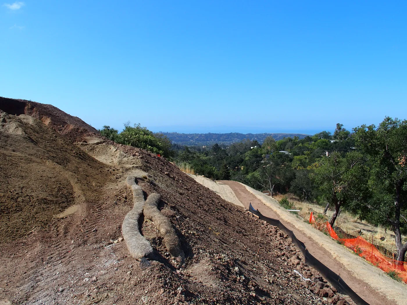 Pritzlaff Conservation Center construction, west slope access trail grading, looking southwest