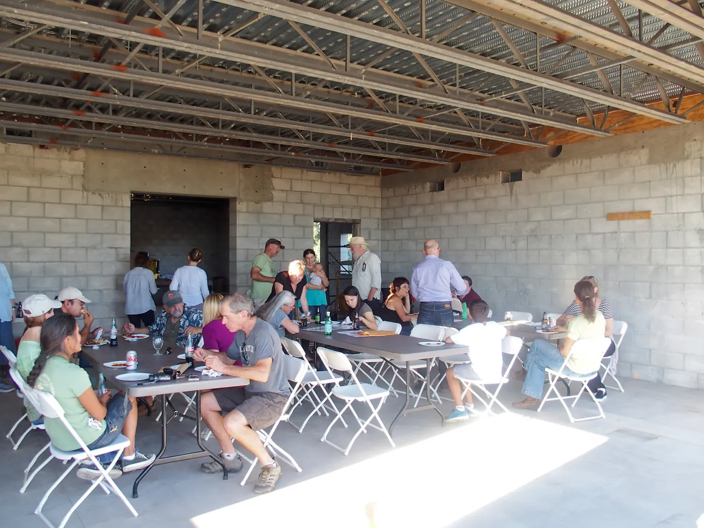 SBBG staff pizza party in future Pritzlaff Conservation Center exhibit space