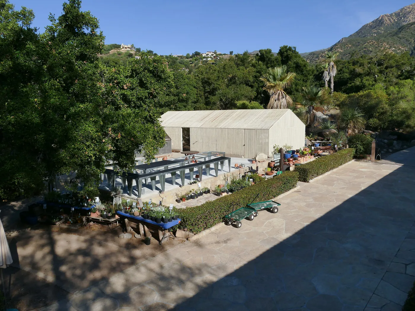 Repaired Lath House and new steel plant benches in the Garden Growers Nursery