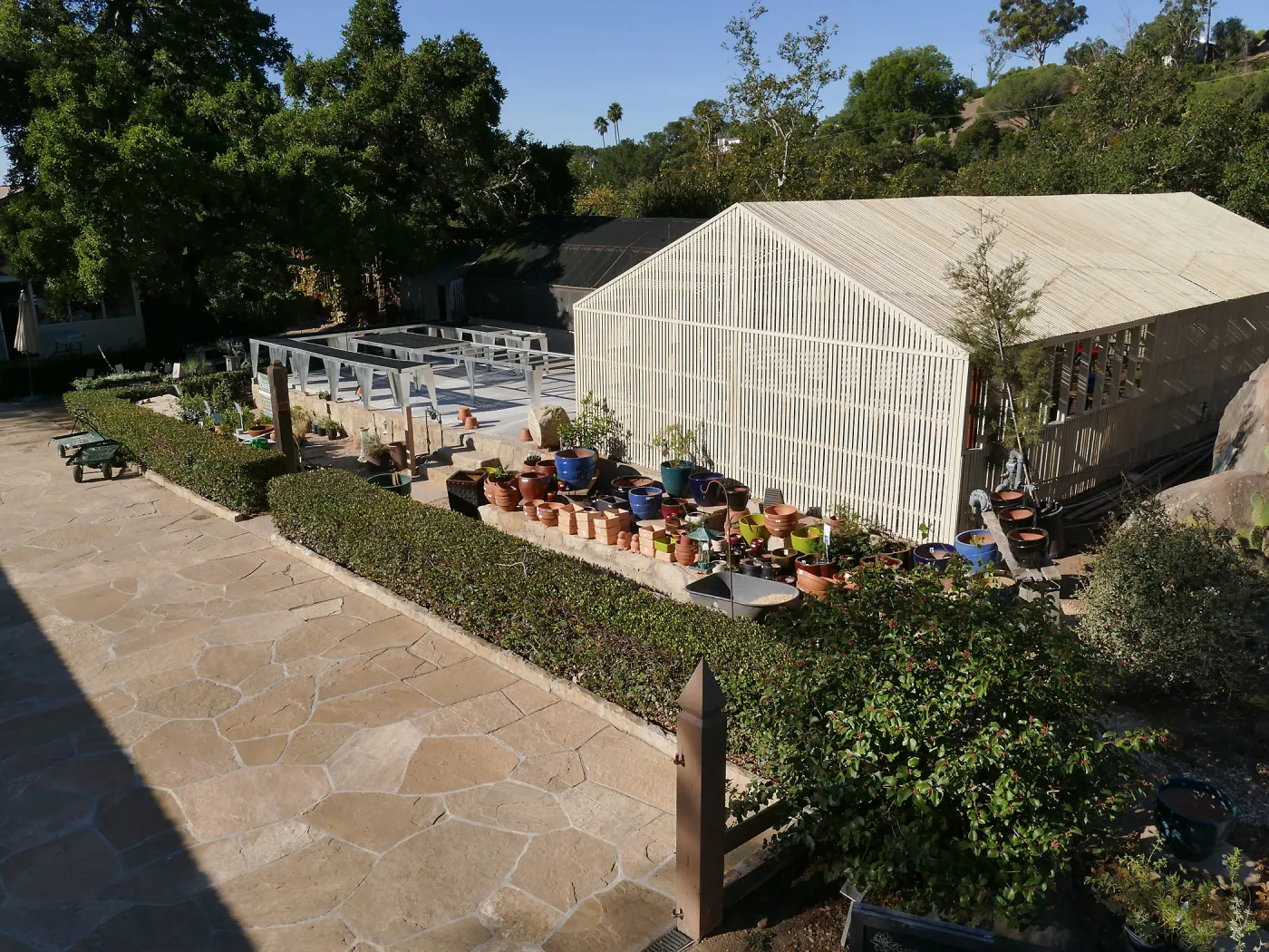 Repaired Lath House and new steel plant benches in the Garden Growers Nursery