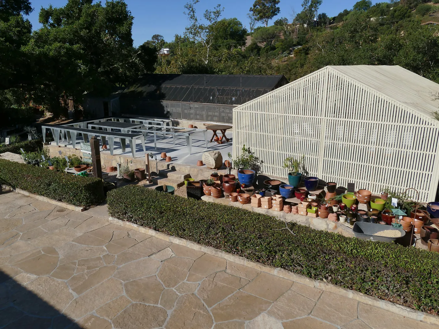 Repaired Lath House and new steel plant benches in the Garden Growers Nursery