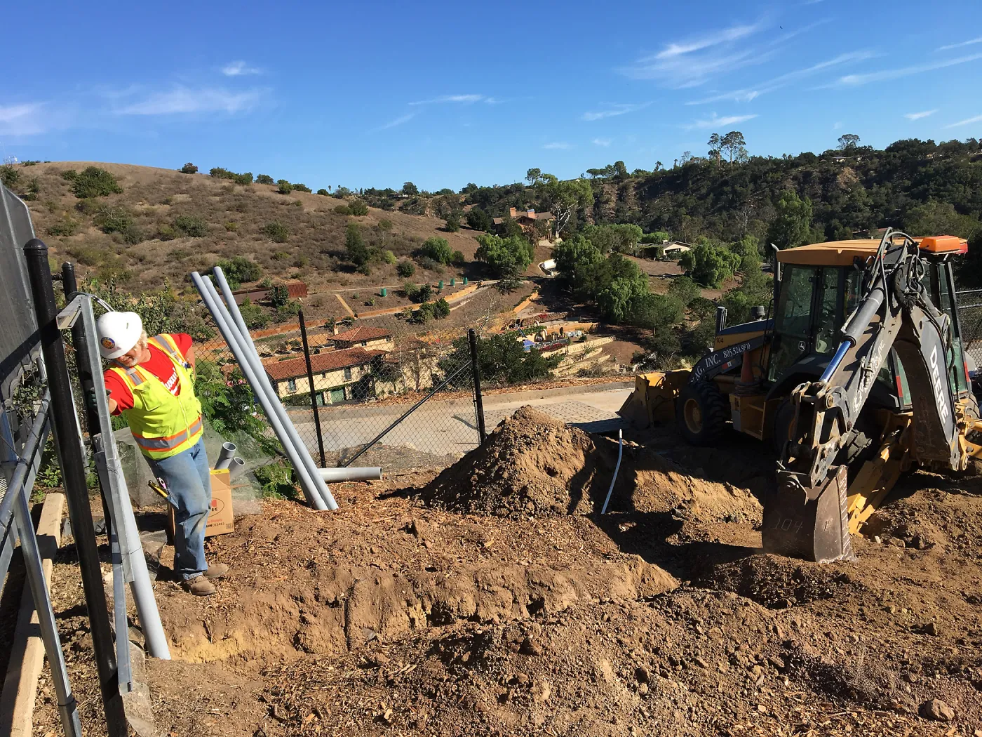 Putting in new electrical line to Horticulture Head House