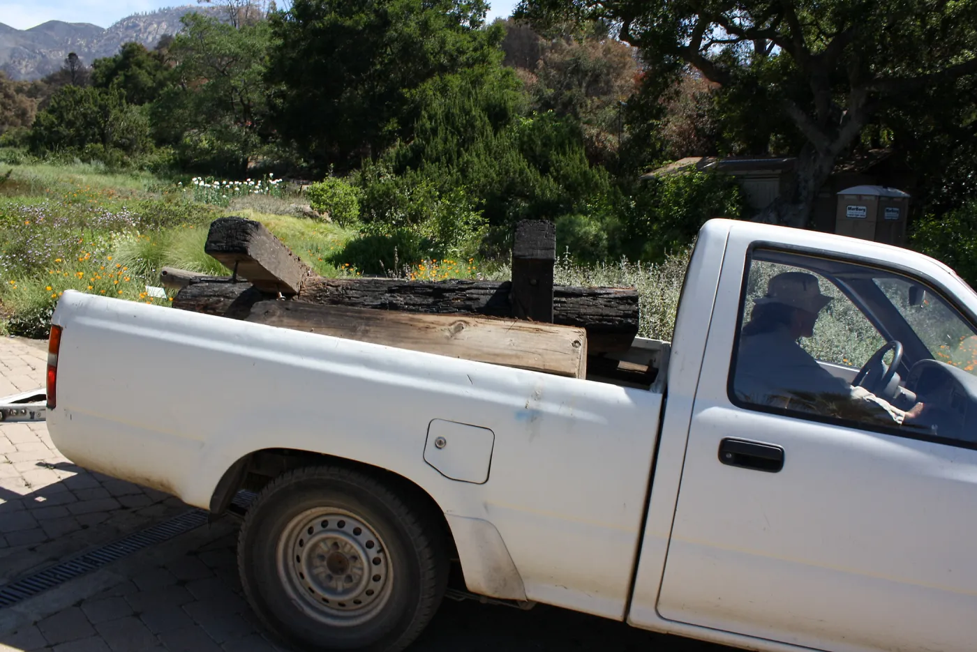 Burned bench being removed after Jesusita Fire