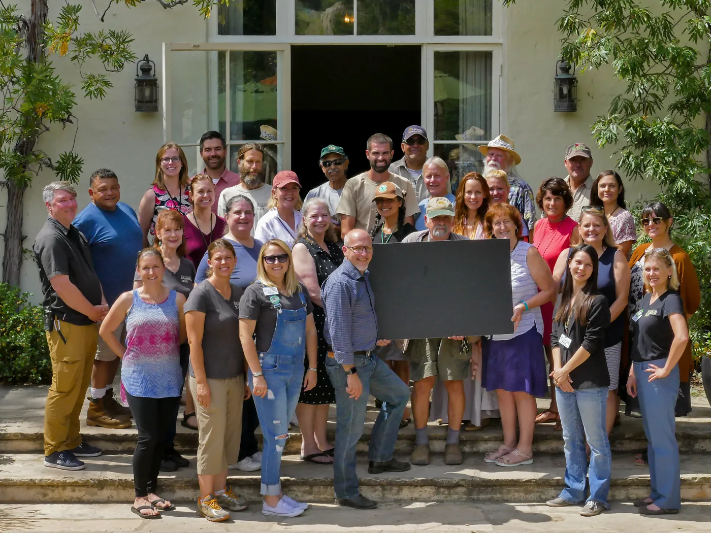 SBBG Staff photo with blank sign