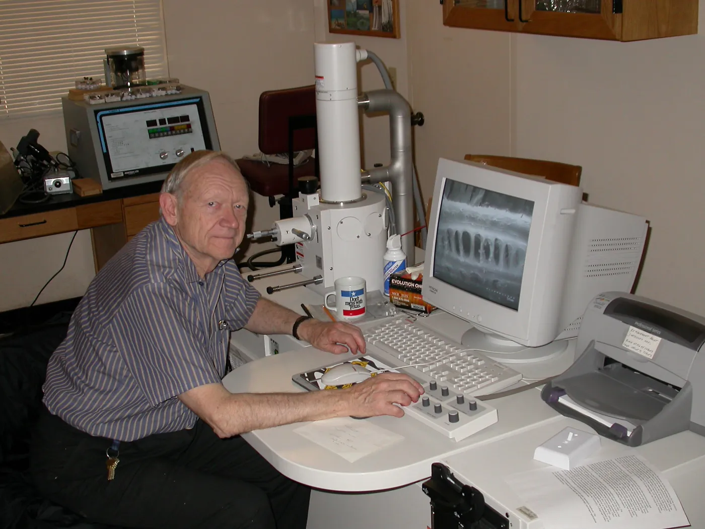 Sherwin Carlson at work with the scanning electron microscope