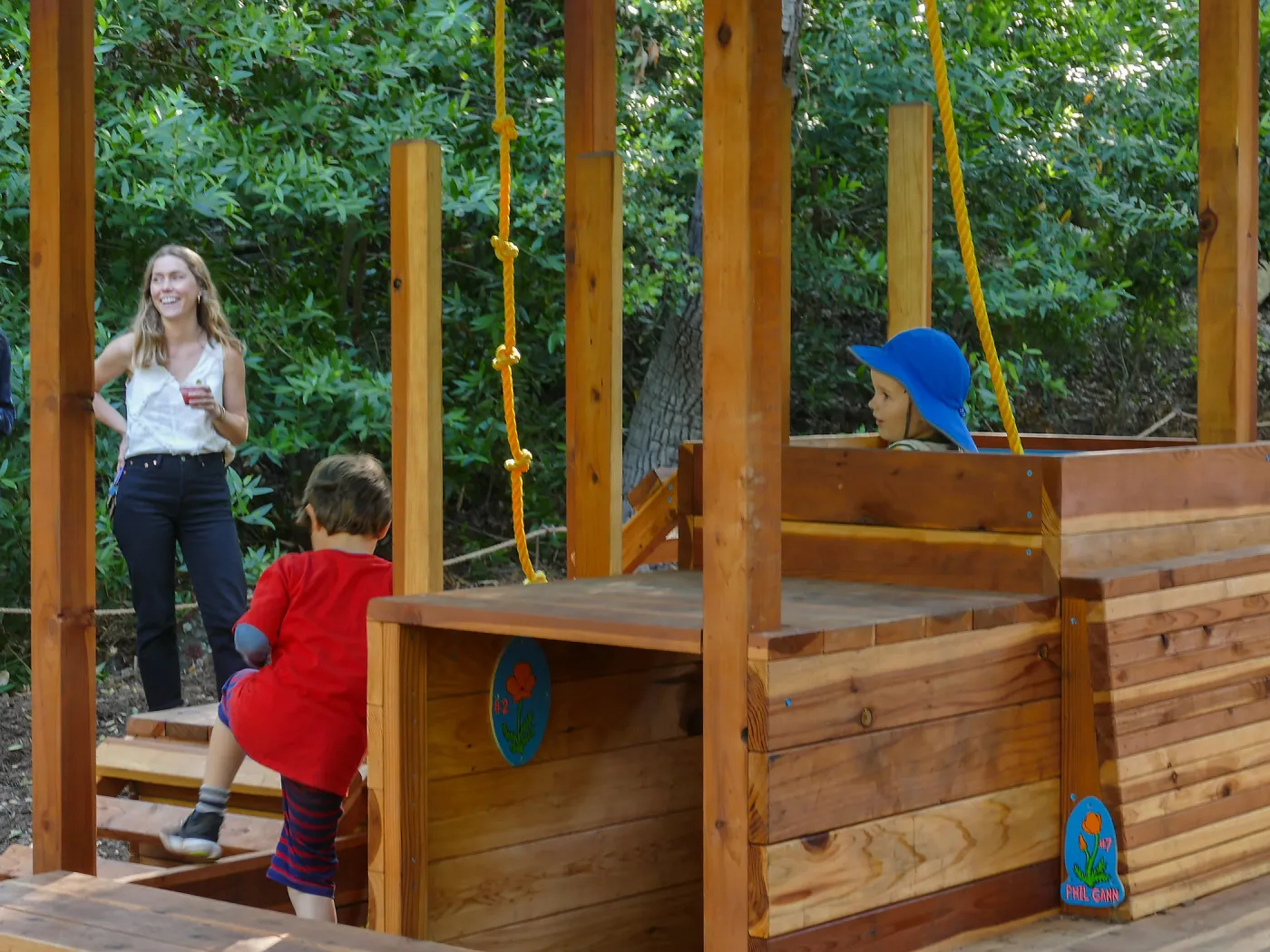 Santa Barbara Botanic Garden Casitas Opening, children playing in â€œCali-Popâ€ Casita
