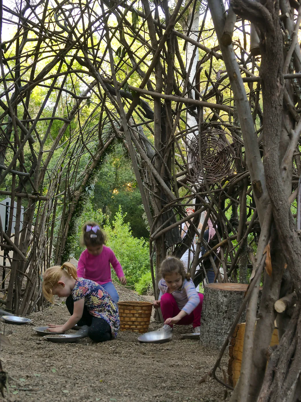 Santa Barbara Botanic Garden Casitas Opening, children playing in the â€œWoodrat Houseâ€ Casita