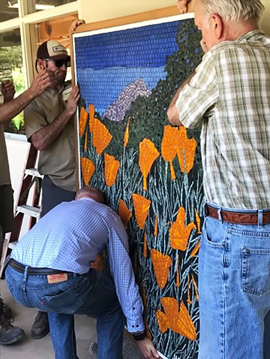 Installation of â€œAfter the Rainsâ€ mosaic by Patti Jacquemain