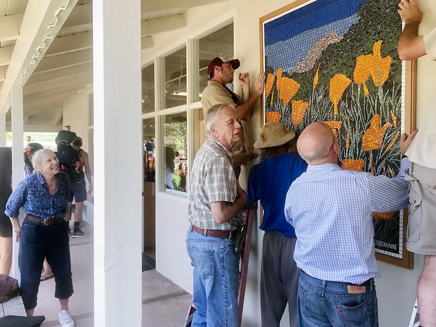 Installation of â€œAfter the Rainsâ€ mosaic by Patti Jacquemain