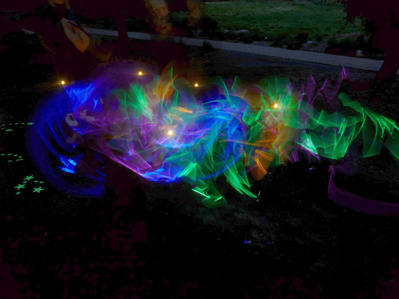 Family Nature Night, children playing with glow sticks