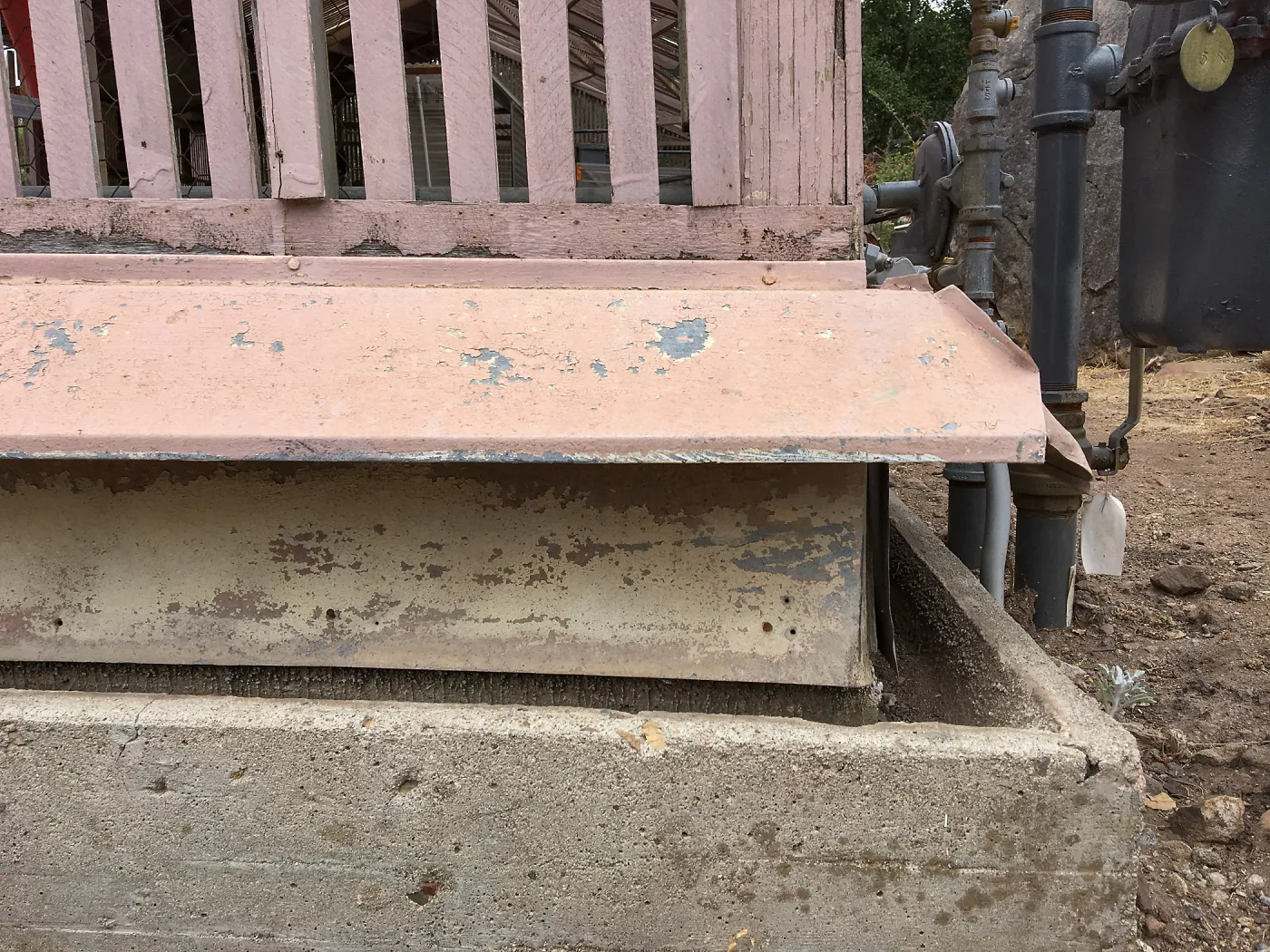 Repair of Garden Growers Lath House, northeast corner, rodent barrier