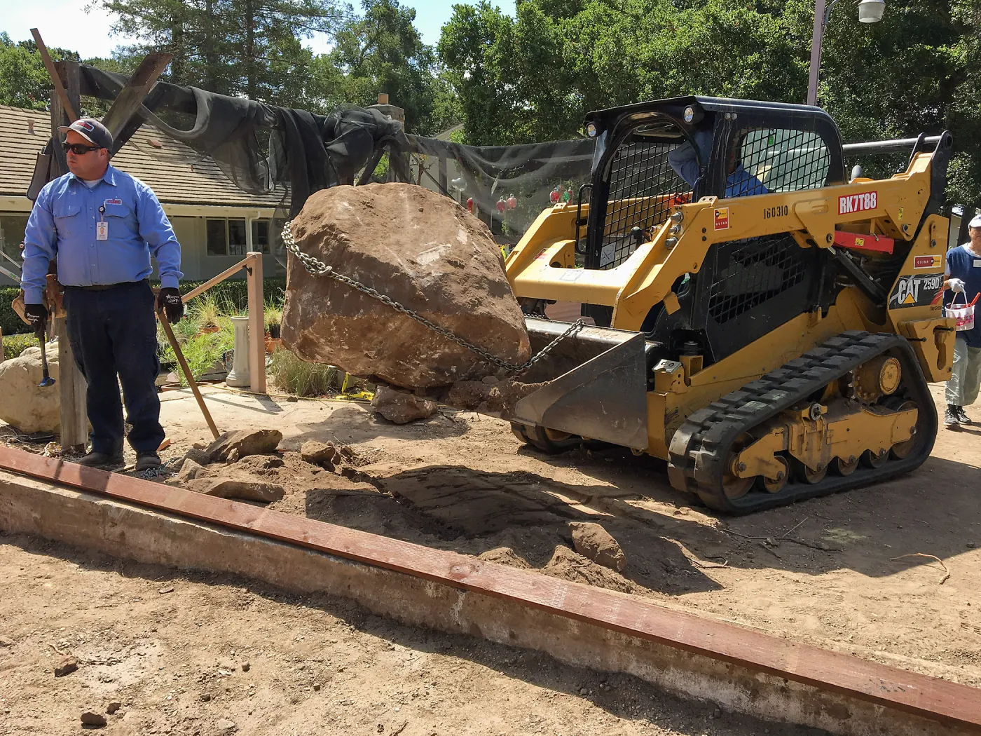 Repair of Garden Growers Lath House. Removing boulders