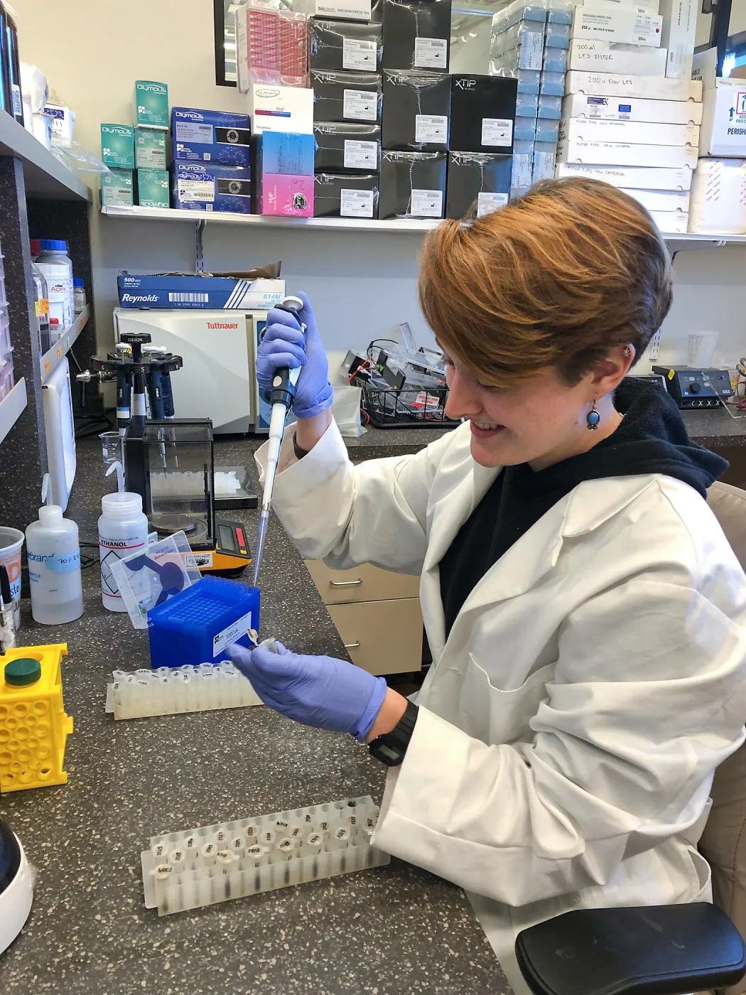 Emily Thomas working in the genetics lab