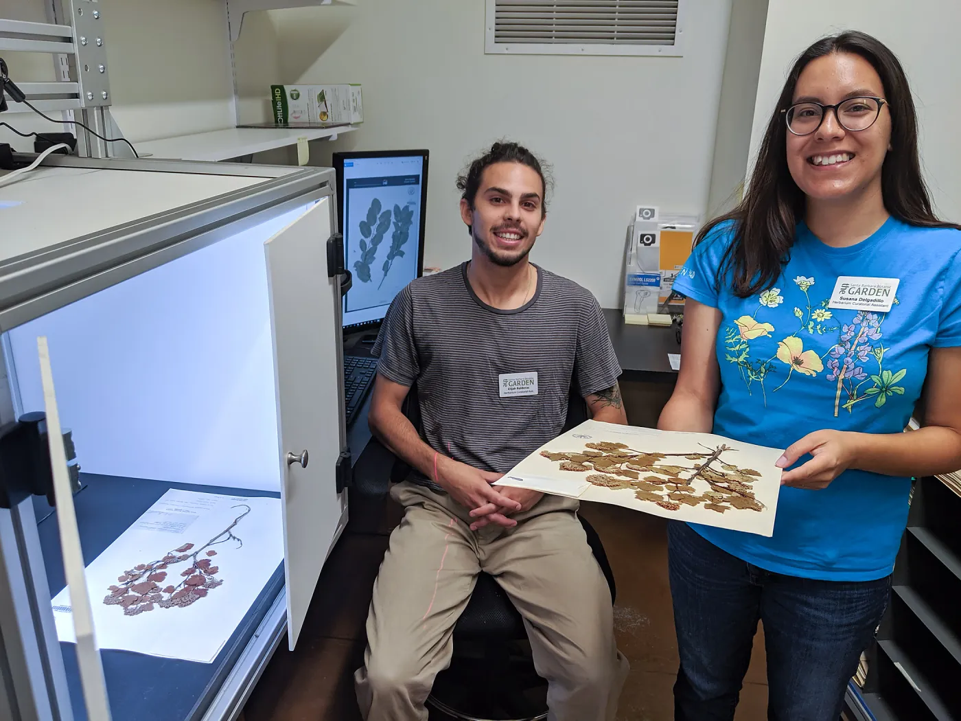 Eli Balderas and Susanna Delgadillo working on the herbarium specimen imaging project