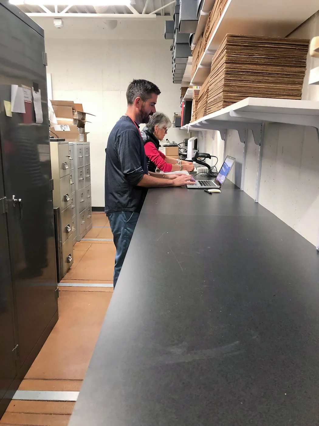 WeDigBio curatorial work party in the herbarium, matt and Lydia barcoding