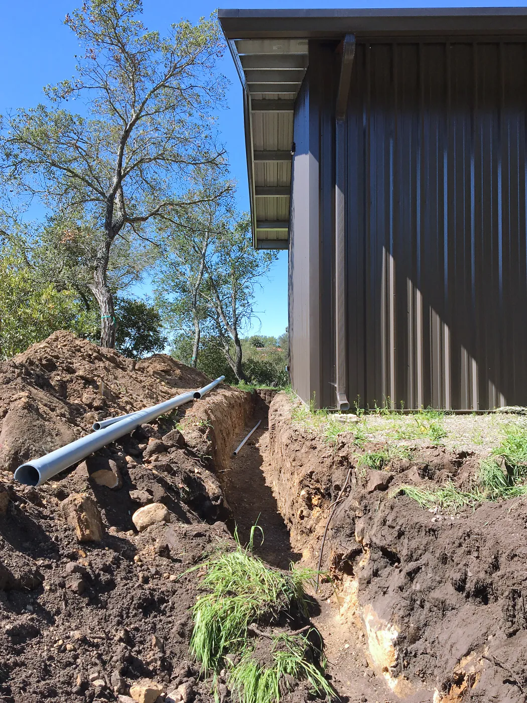 Trenching at Hansen site for communications and electrical lines