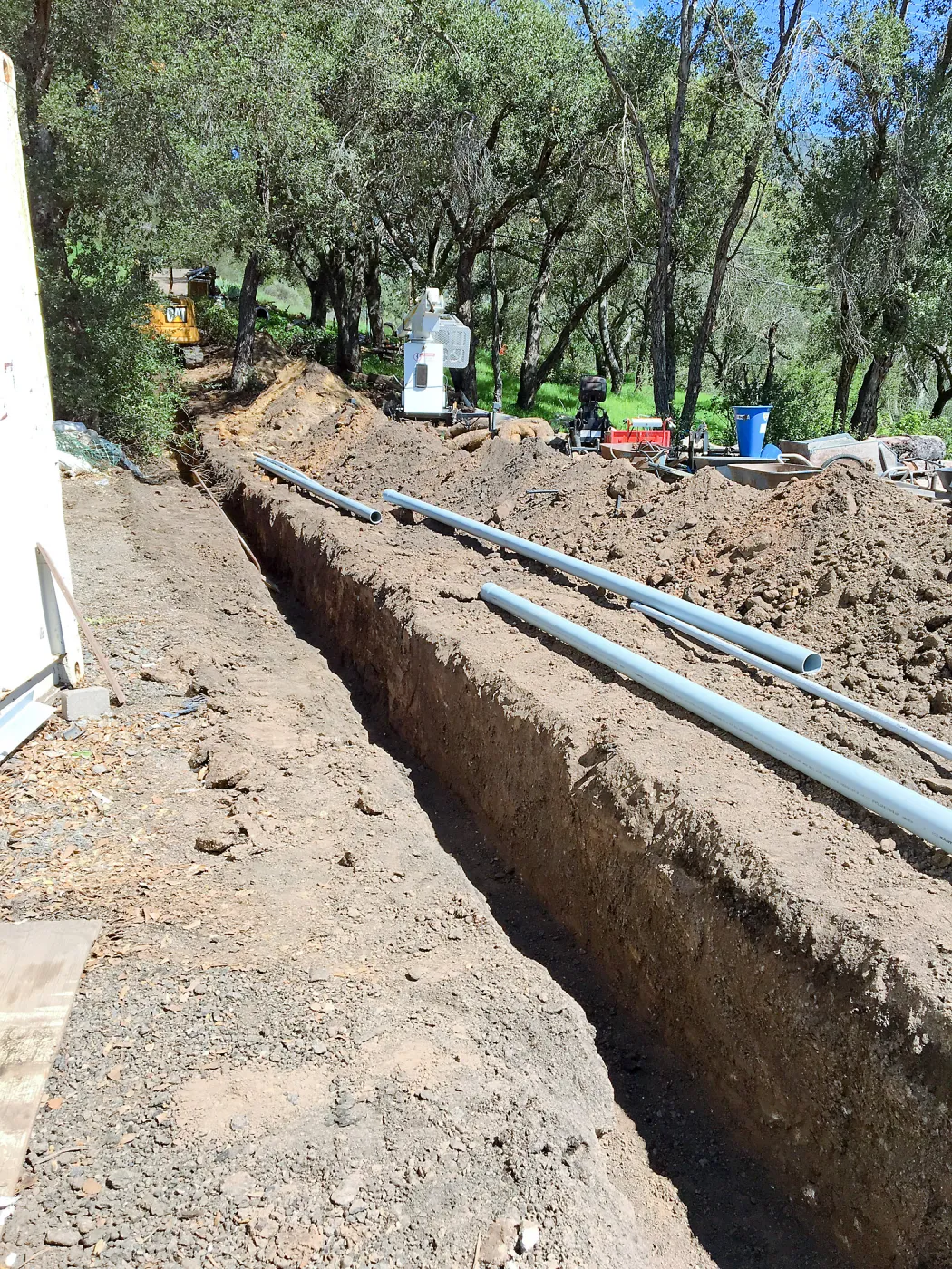 Trenching at Hansen site for communications and electrical lines