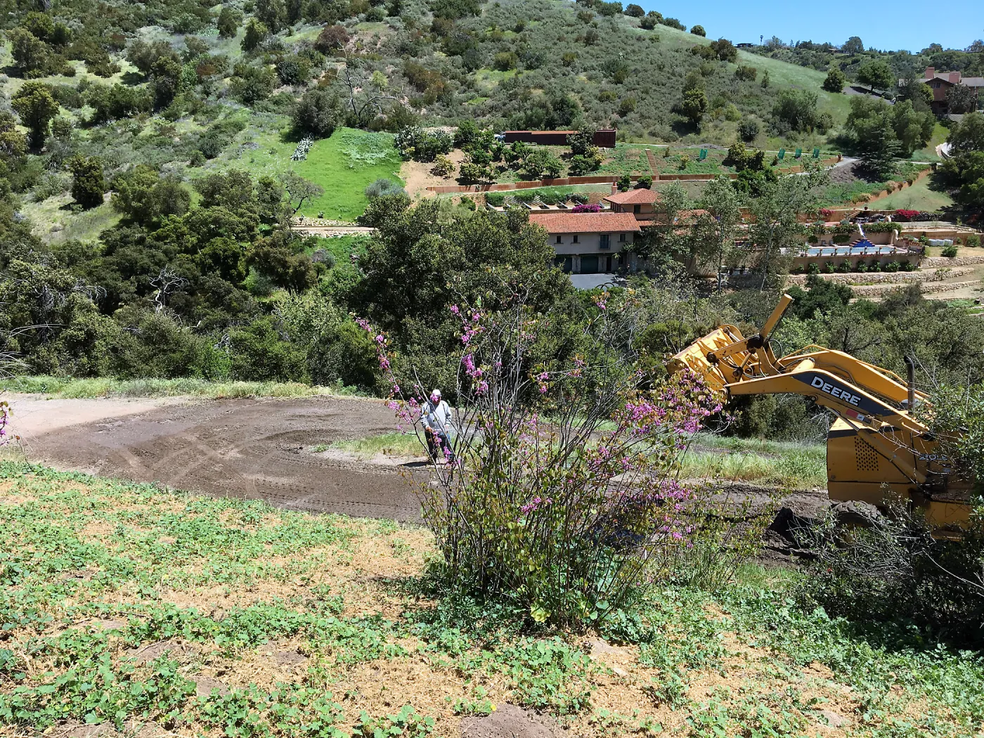 Chip sealing service road on East Slope of Garden