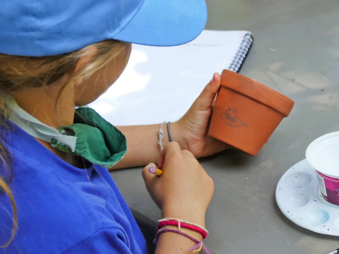 Acorn Adventurers Summer Camp, flower pot decorating activity