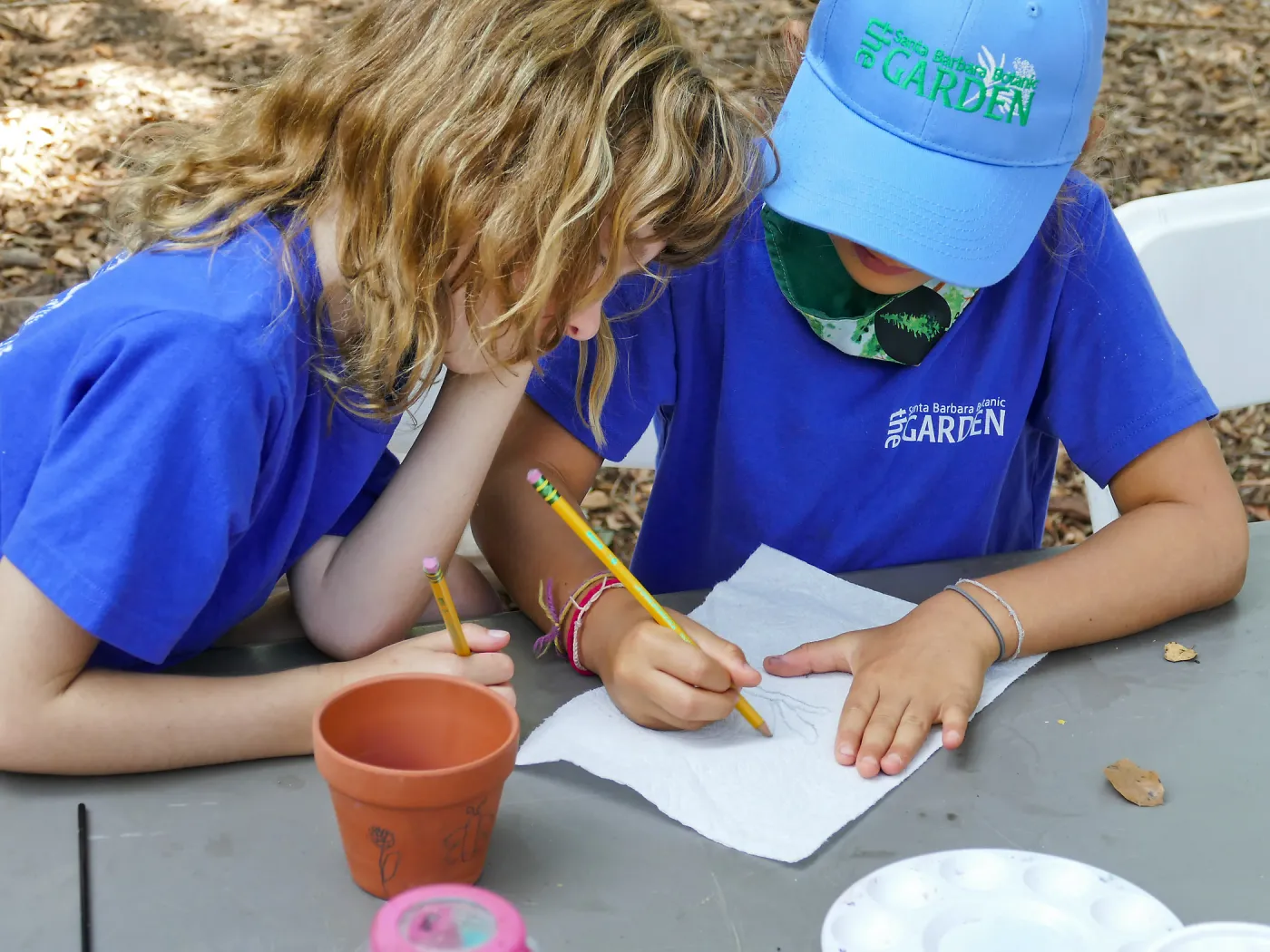 Acorn Adventurers Summer Camp, flower pot decorating activity