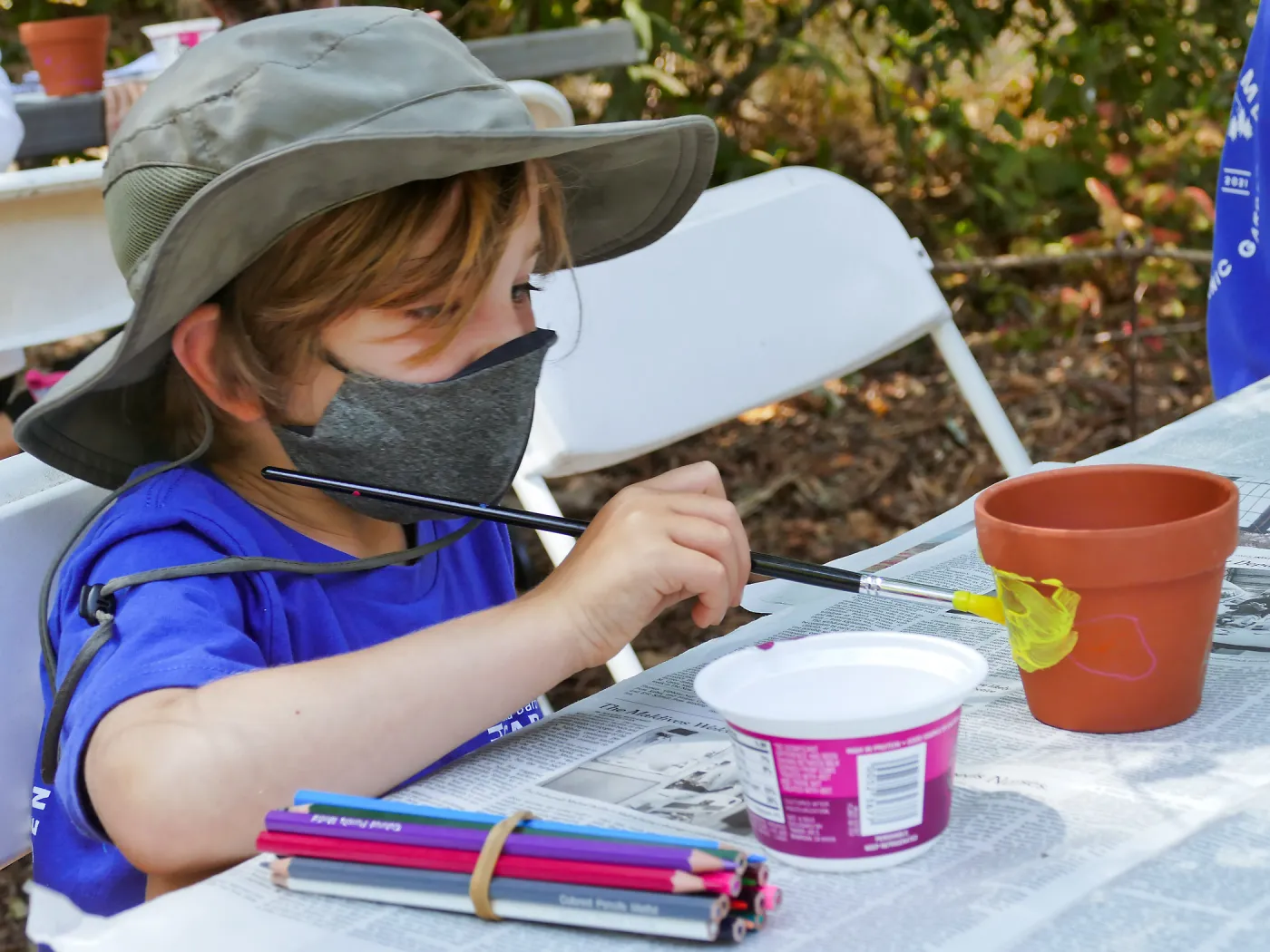 Acorn Adventurers Summer Camp, flower pot decorating activity