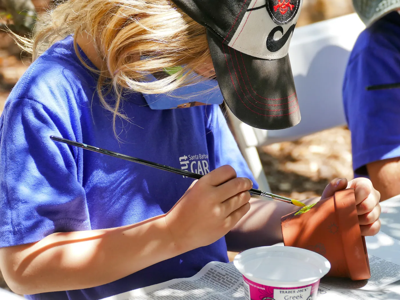 Acorn Adventurers Summer Camp, flower pot decorating activity