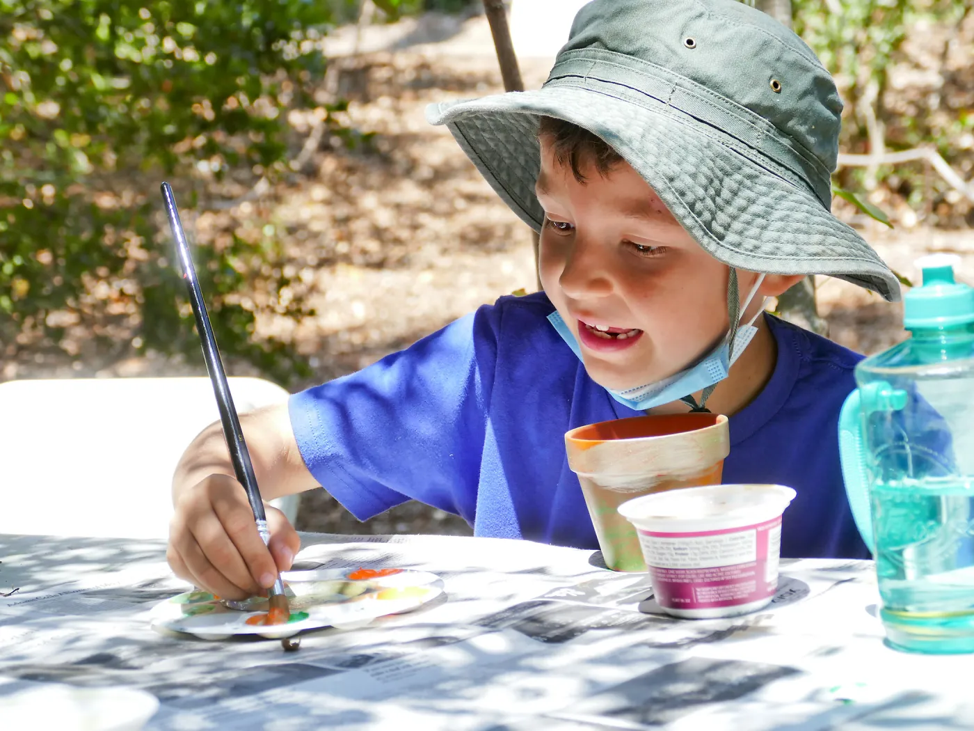 Acorn Adventurers Summer Camp, flower pot decorating activity